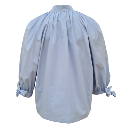 Sky blue blouse with gathered collar and puff bow tied sleeves back view