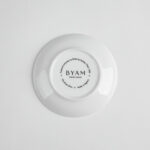 base of a white bone china coaster showing brand name and made in england