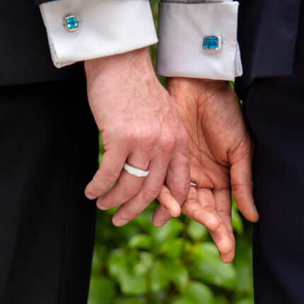A modern couple wearing our ‘Off the Cuff’ octagon and cushion cufflinks along with the ‘Hidden Gem’ ring for him