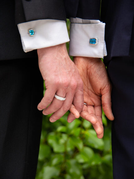 A modern couple wearing our ‘Off the Cuff’ octagon and cushion cufflinks along with the ‘Hidden Gem’ ring for him