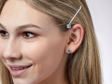 ‘Hairloom’ hair slider with a square Ostro Blue Topaz set in Sterling Silver being worn by model