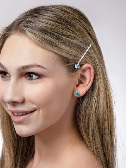 ‘Hairloom’ hair slider with a square Ostro Blue Topaz set in Sterling Silver being worn by model