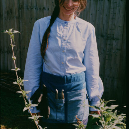 Styling inspiration: Marie pale blue blouse with gathered neck and lace cuffs, made in London by Saywood. Worn with Gardener's Tool Belt.