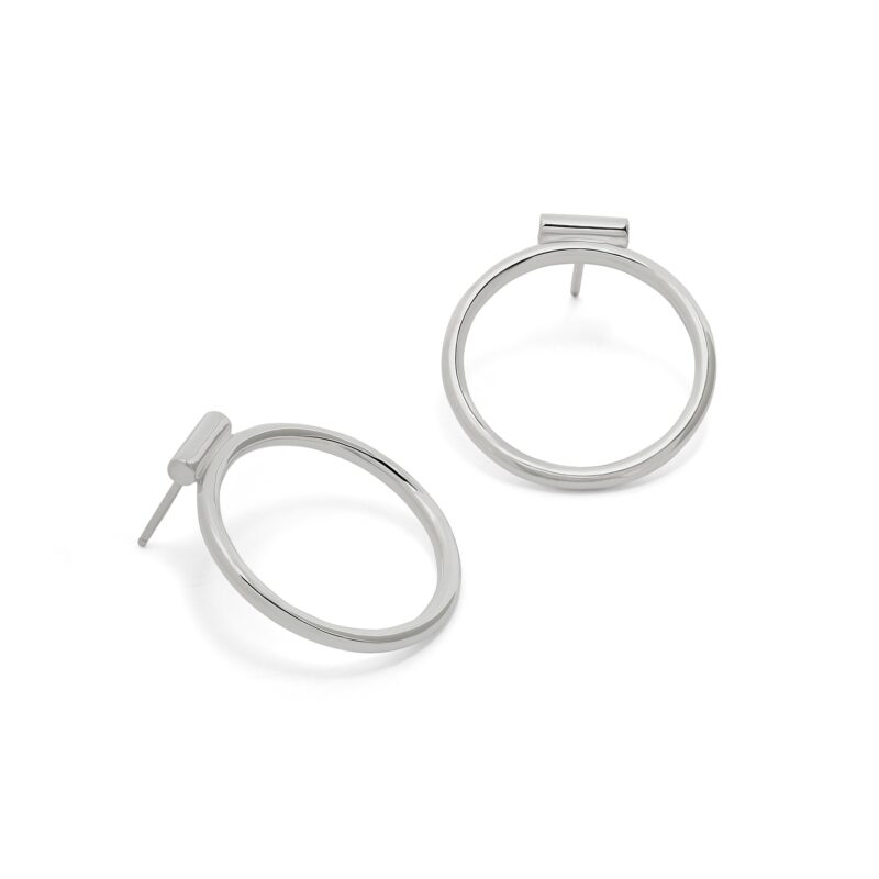 Pair of silver hoop earrings on a white background