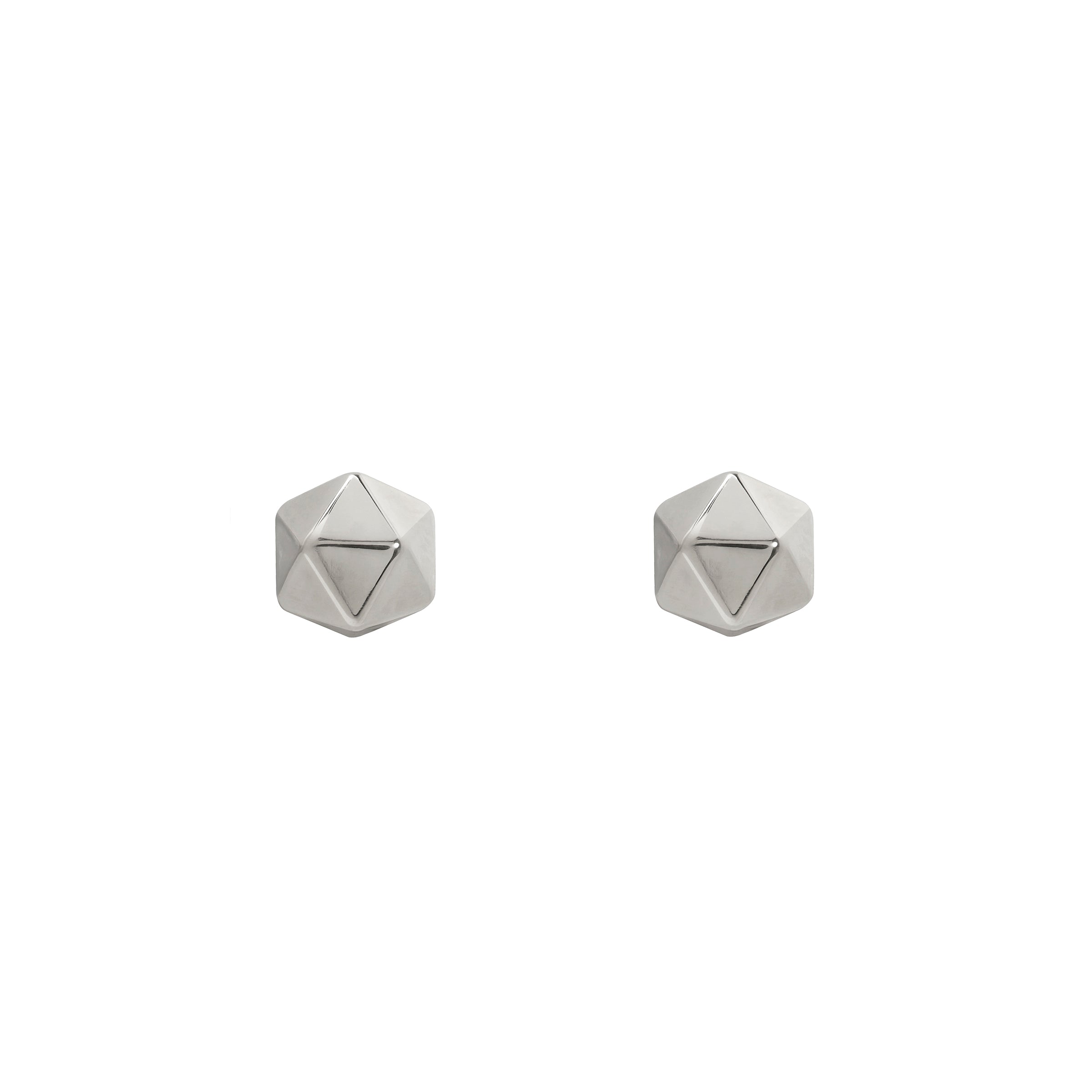 Pair of silver geometric stud earrings on a white background