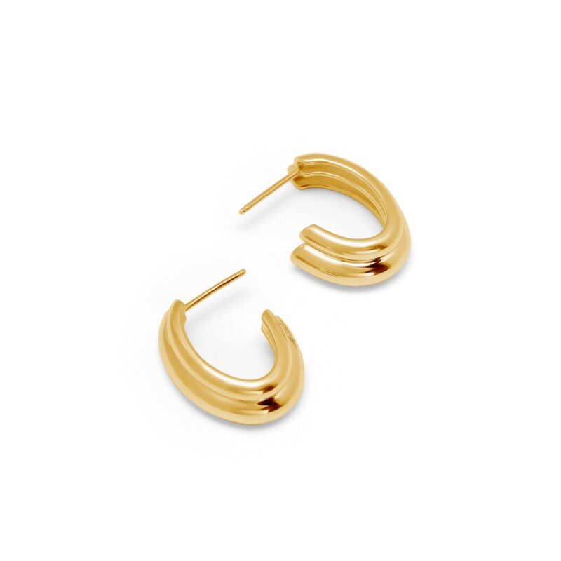 Gold hoop earrings on a white background