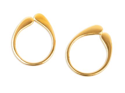 Gold hoop earrings on a white background