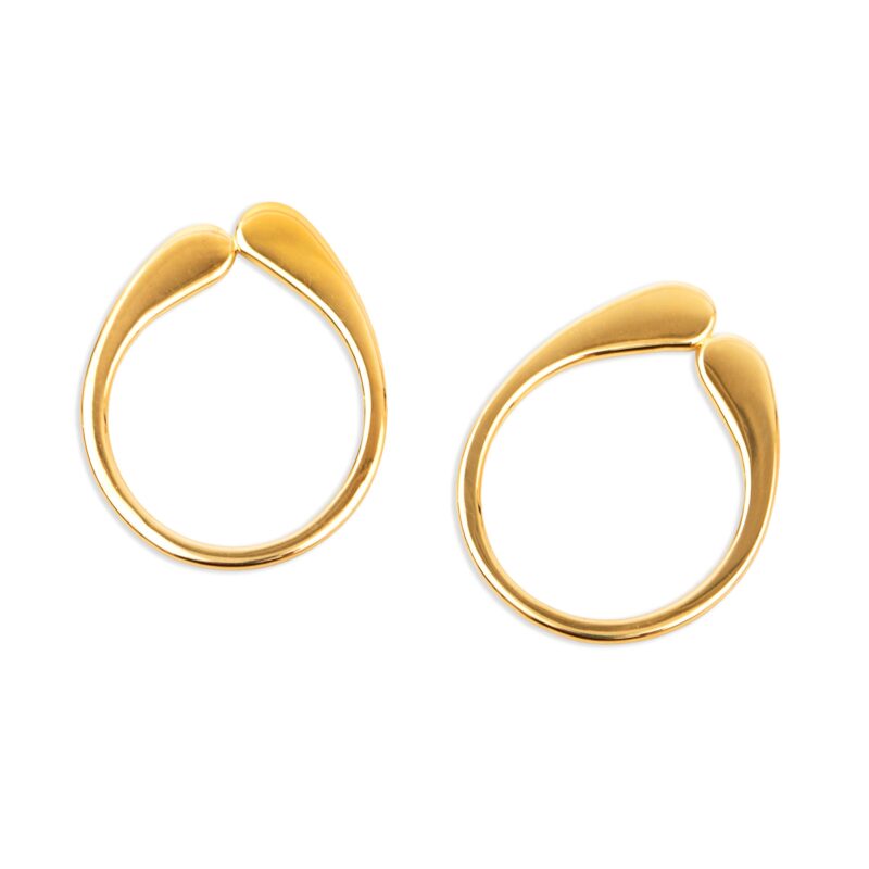 Gold hoop earrings on a white background