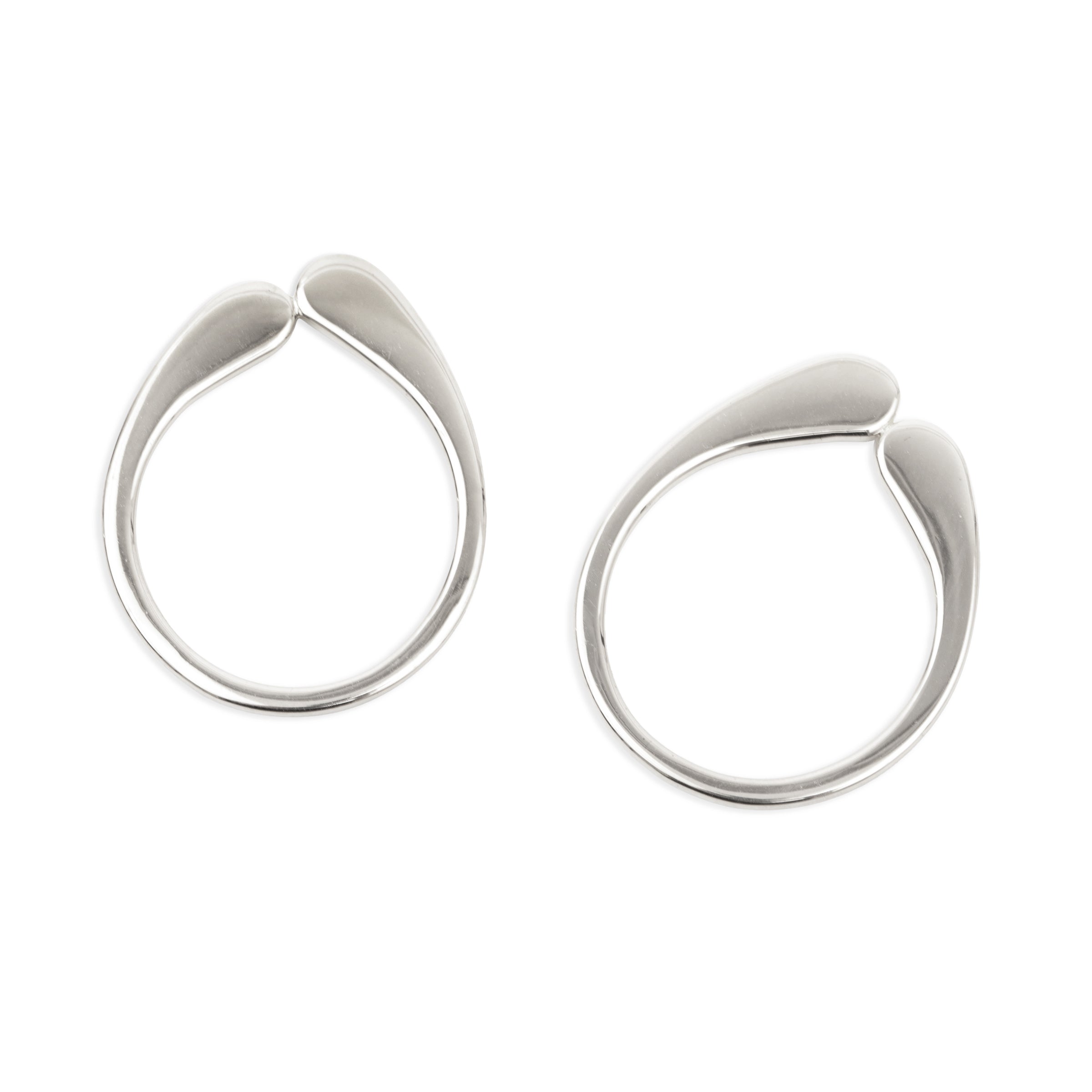 Pair of silver hoop earrings on a white background