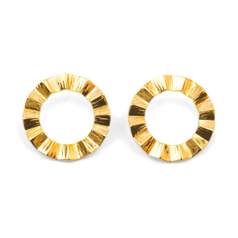 Pair of gold hoop earrings on a white background