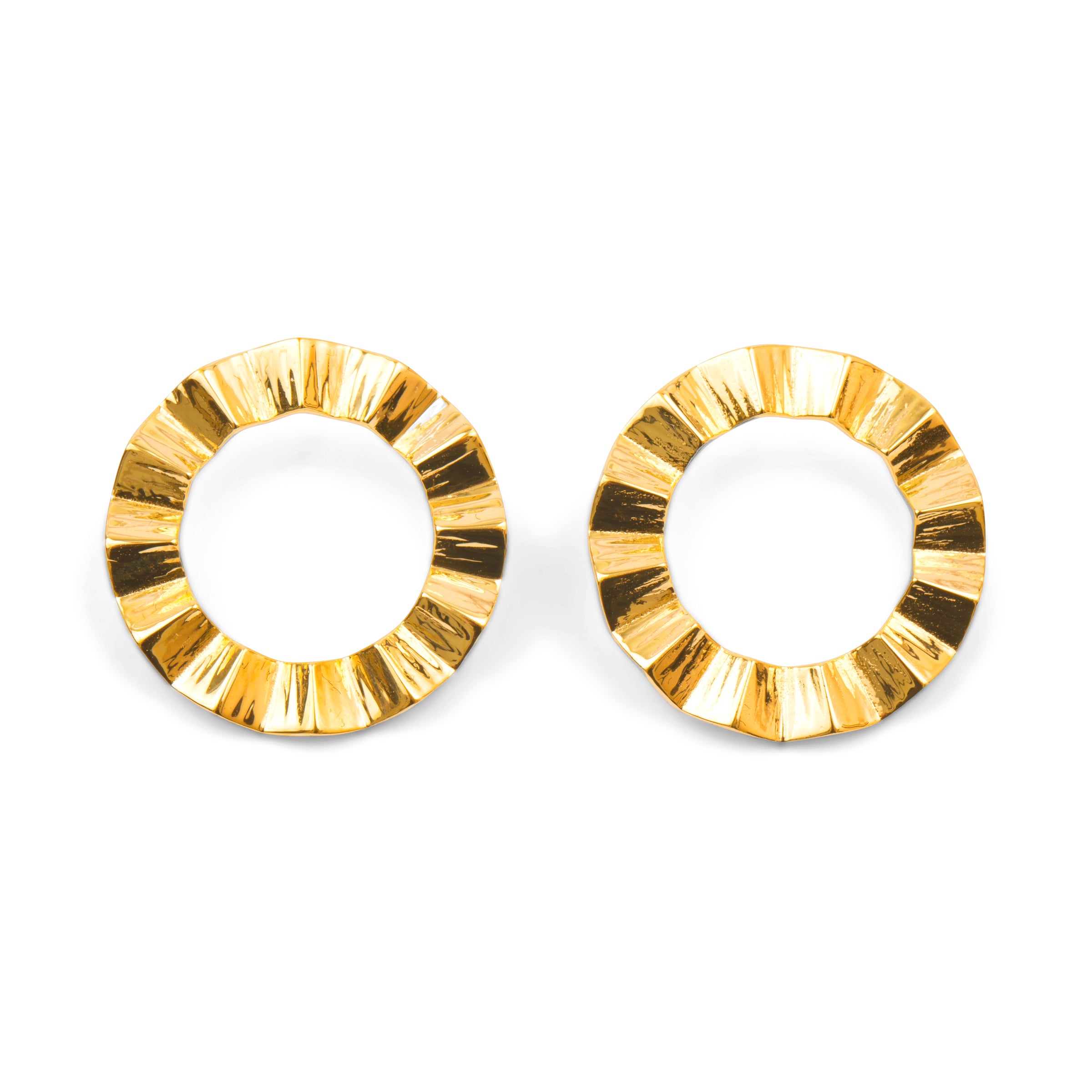 Pair of gold hoop earrings on a white background