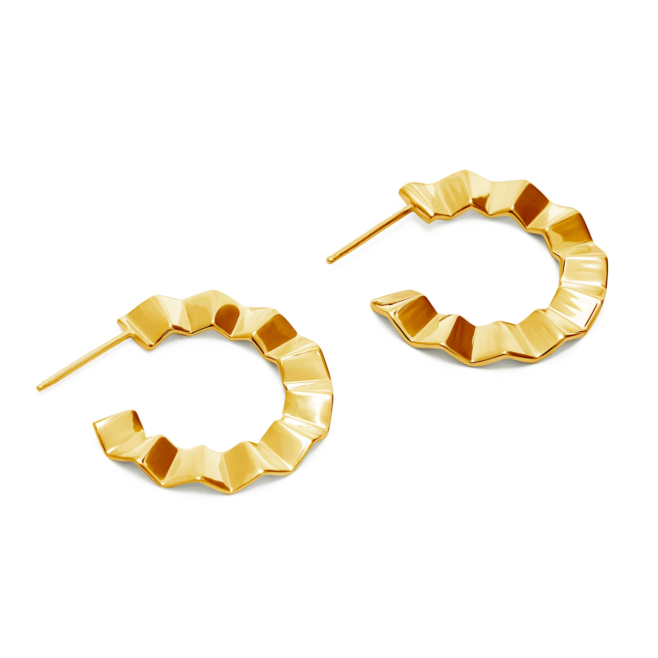 Gold hoop earrings with geometric design on a white background