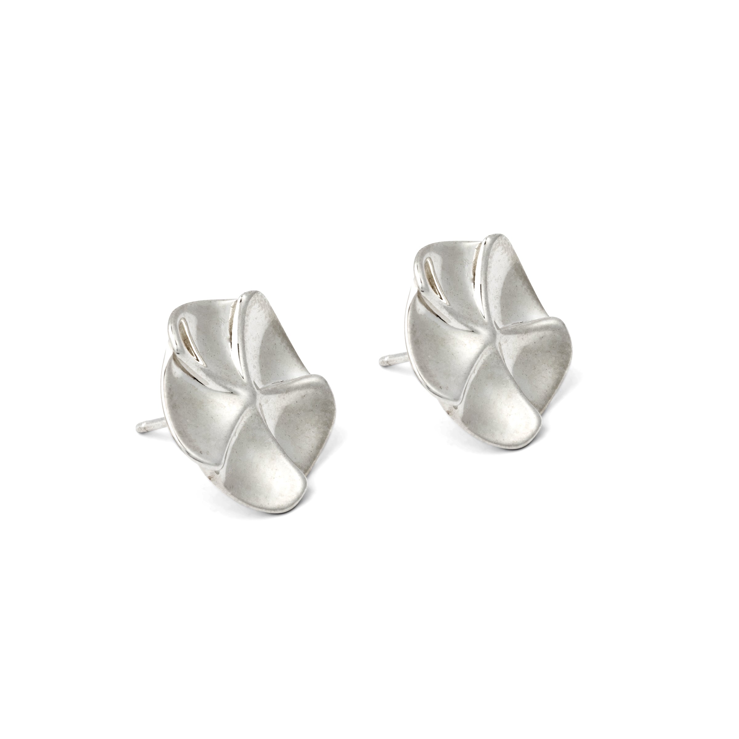 Pair of silver floral earrings on a white background