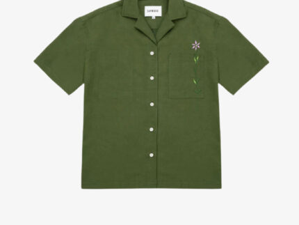 Frances unisex Cuban shirt in rich olive green surplus fabric with embroidered flower chest pocket, made in London by Saywood