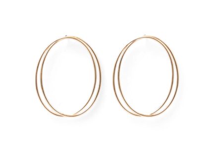 A pair of thin, oval-shaped earrings with a silver finish, displayed against a white background.
