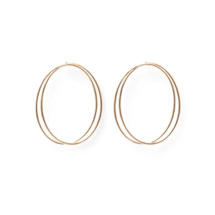 A pair of thin, oval-shaped earrings with a silver finish, displayed against a white background.