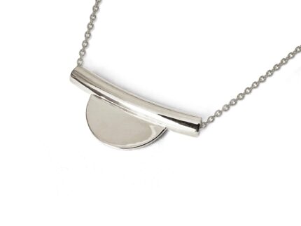 Silver necklace with a pendant on a white background