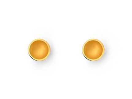 Pair of gold round earrings on a white background
