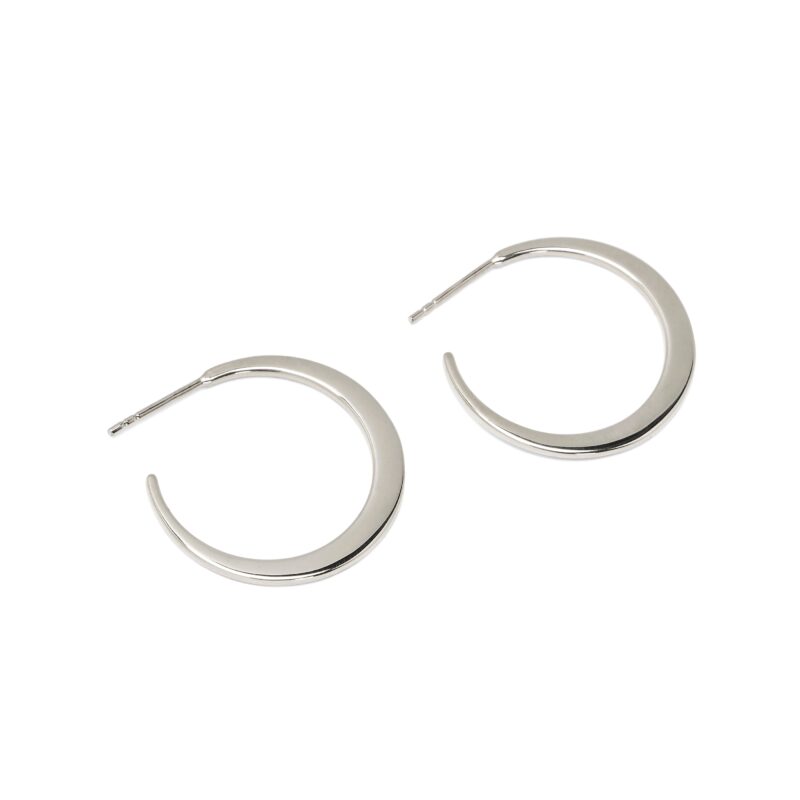 Pair of silver hoop earrings on a white background