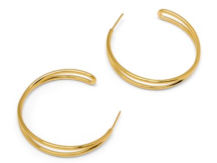 Gold hoop earrings on a white background
