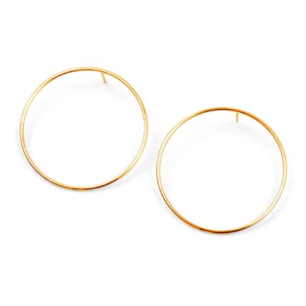 modern round circle earrings in gold on white background