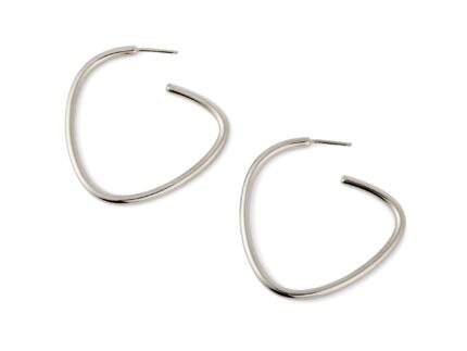 A pair of silver-colored curved hoop earrings against a white background.