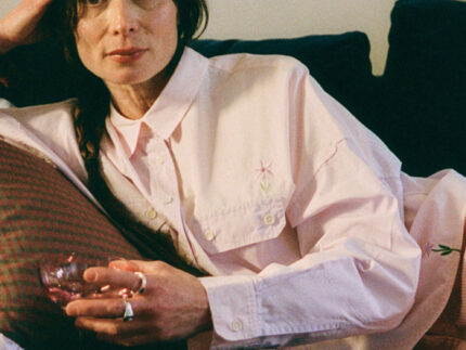 Close-up detail of Jules pink lilac patchwork shirt with embroidered flower detail, made in England by Saywood