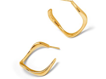 Gold hoop earrings on a white background