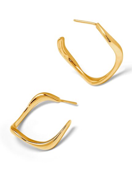 Gold hoop earrings on a white background