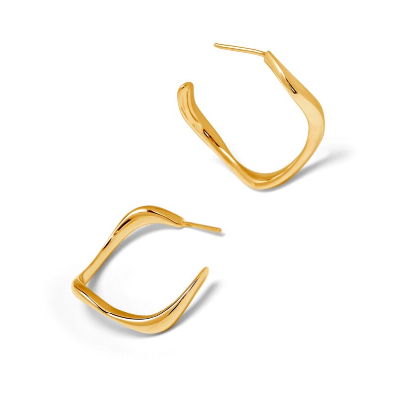 Gold hoop earrings on a white background
