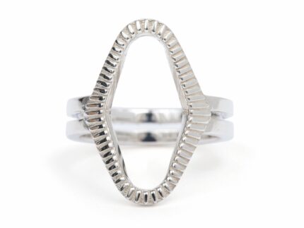 A bold, silver-colored geometric ring with a curving opening design resembling a snake's mouth.