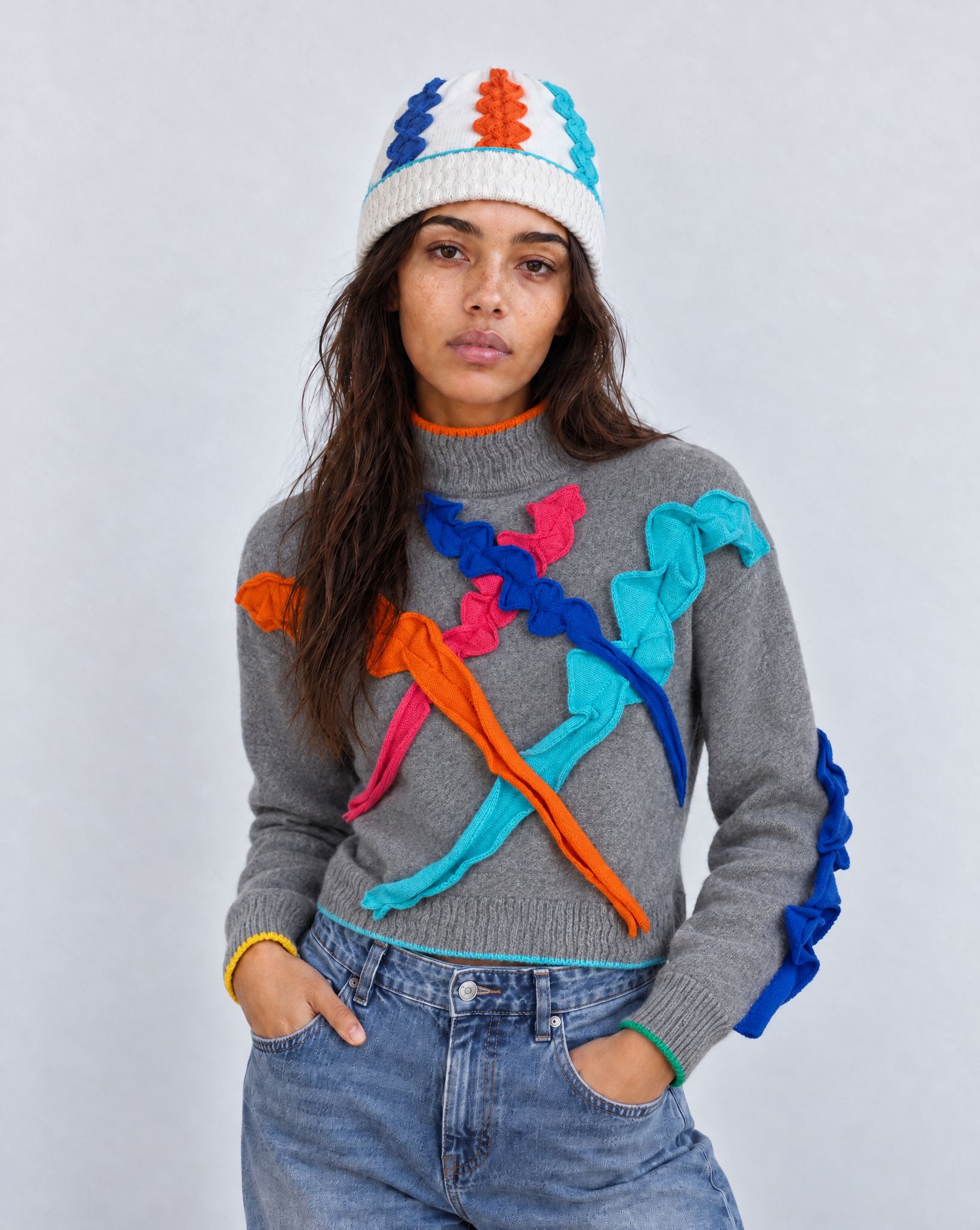 Tallis Jumper and beanie on model grey